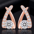 1 karaat moissanite (lab diamant) oorbellen | gekruist design, 925 sterling zilver, 14k roségoudverguld
