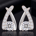 1 karaat moissanite (lab diamant) oorbellen | gekruist design, 925 sterling zilver, rhodiumverguld